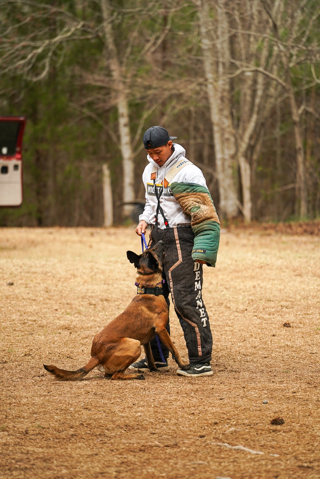 Woof Tang K9 trainer working a Belgian Malinois during professional bitework and decoy training.